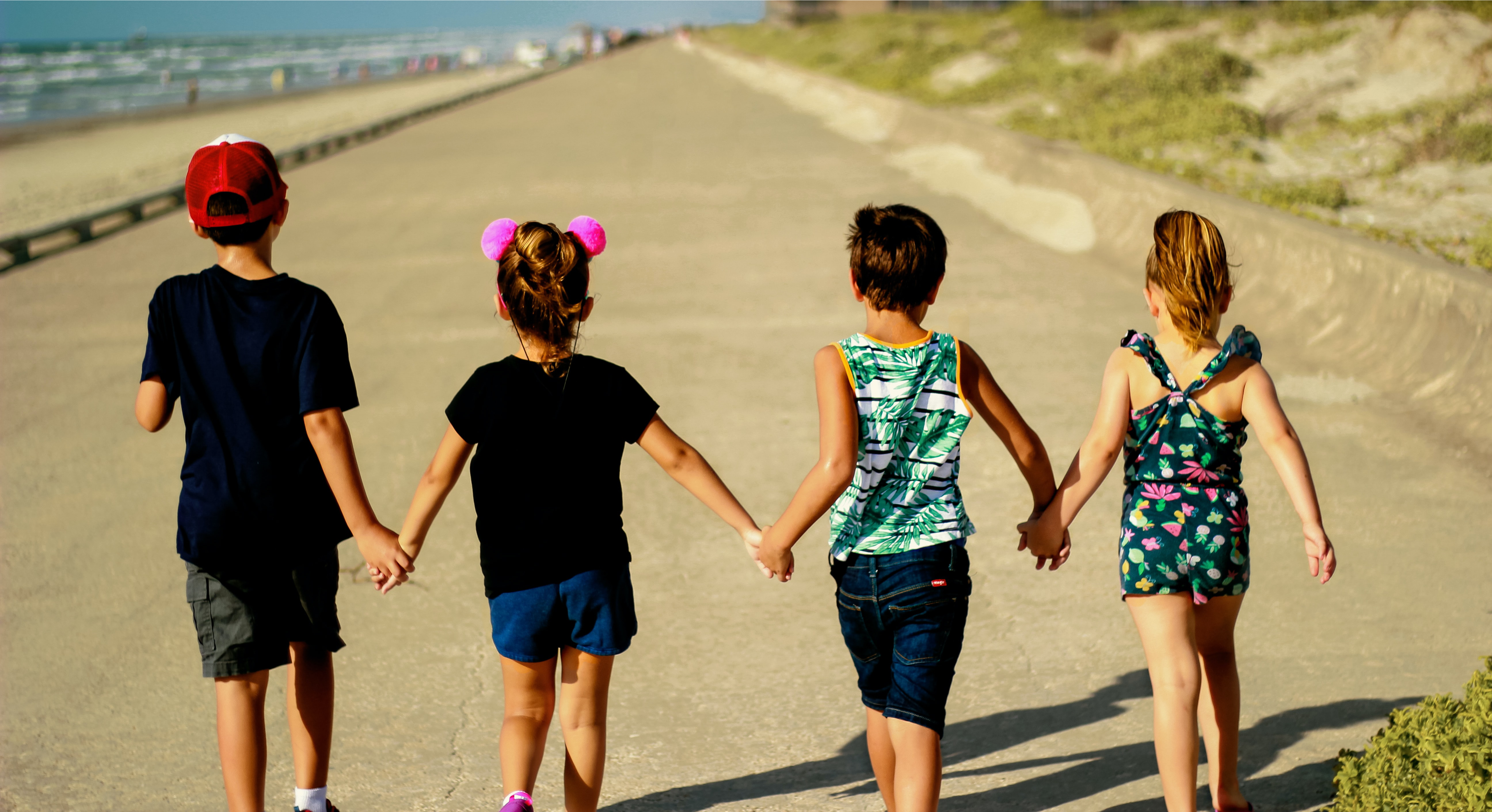 Photo of Children Holding Hands